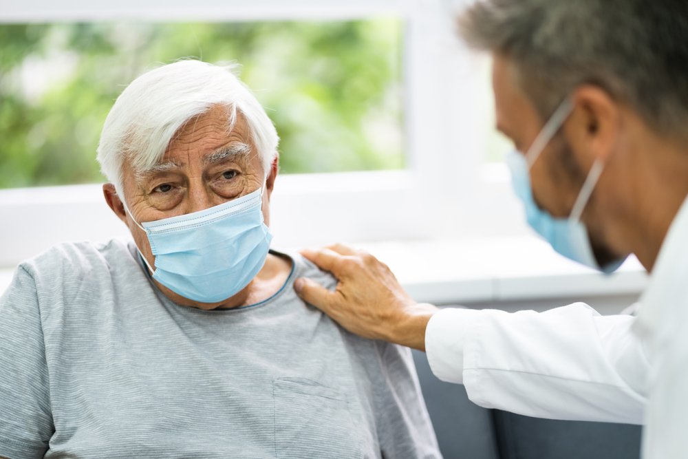 Doctor,Talking,To,Elderly,Patient,At,Home